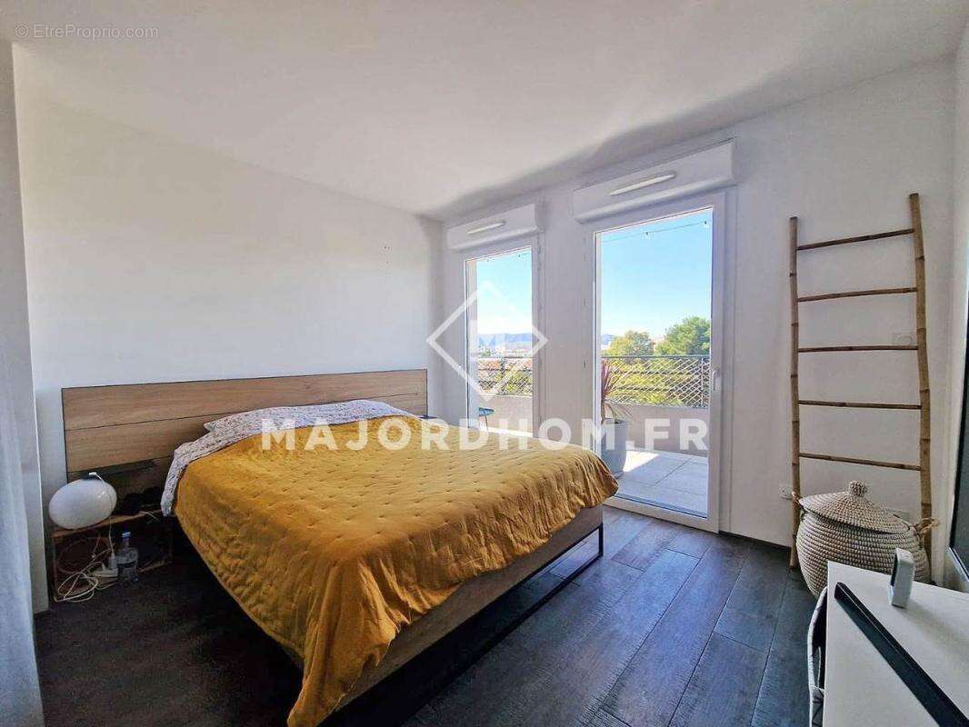 Vente Type 4 dernier étage terrasse de 35 m2 calme vue dégagée 13010 - photo 12