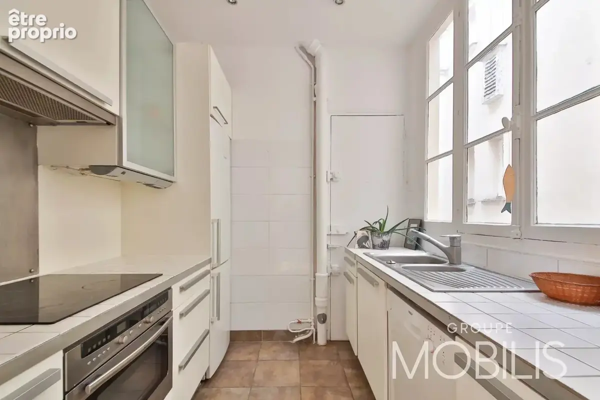 Paris 16 - passy - appartement familial de 103m2 - 2/3 chambres - balcon, etage eleve, lumineux, calme - photo 8