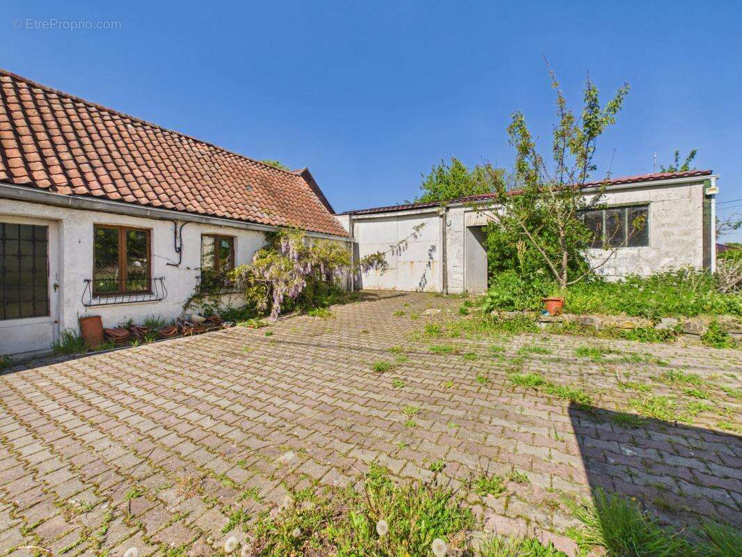 Maison à LECELLES