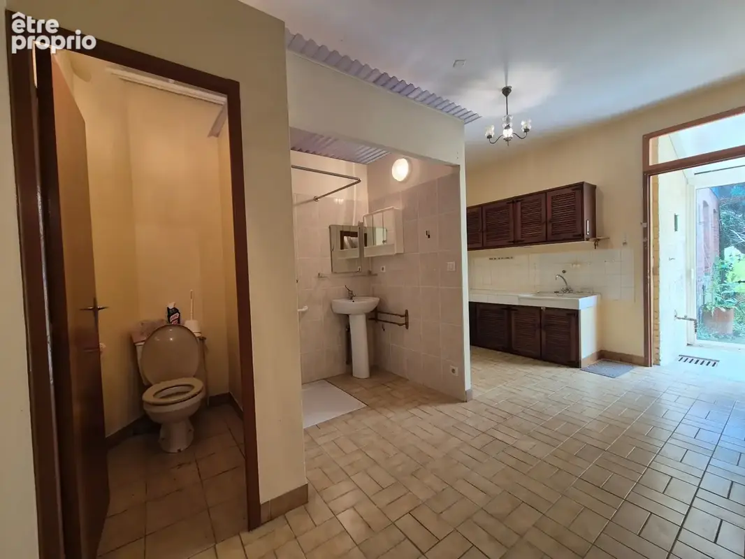 Indre (36) : maison de bourg à vendre 6 pièces de 156 m2 Véranda jardin clos et appartement supplémentaires ! - photo 6