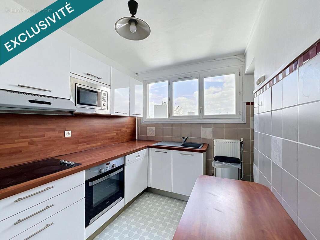 Photo 3 - Appartement à PARIS-19E