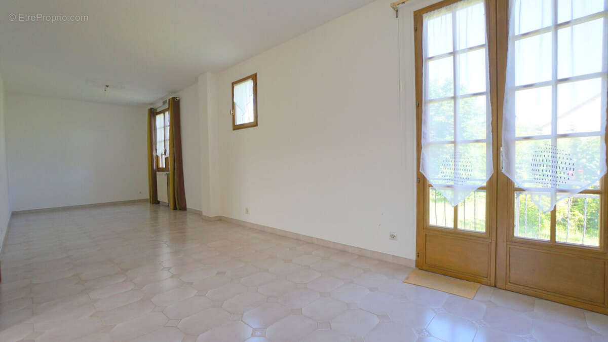 Maison à AUBERGENVILLE