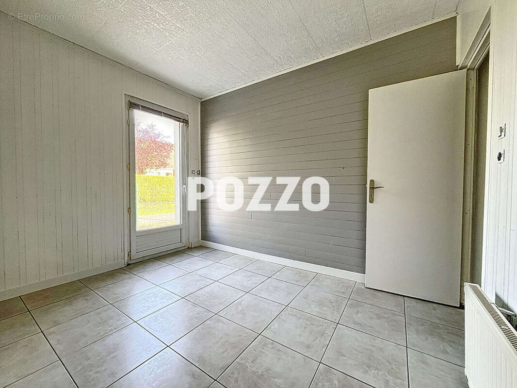 Maison à LE MESNIL-RAOULT