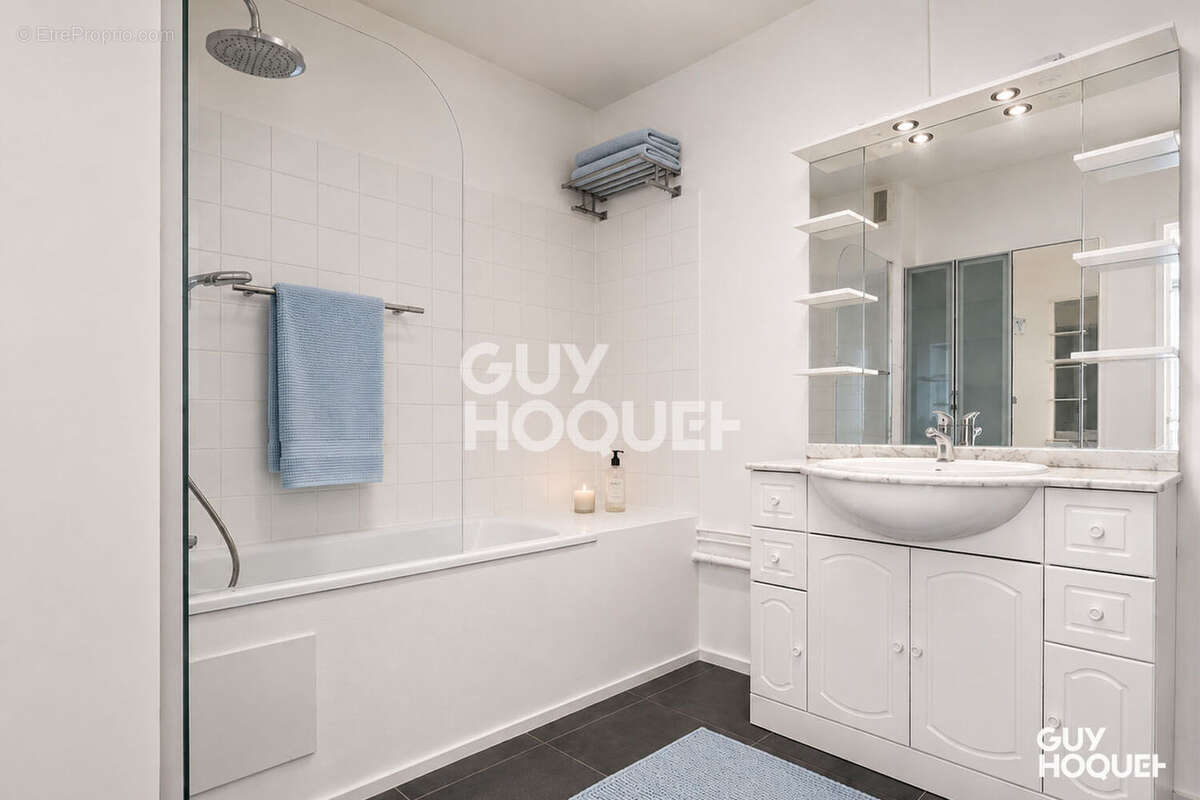 Appartement traversant de 85 m² + balcon - photo 9