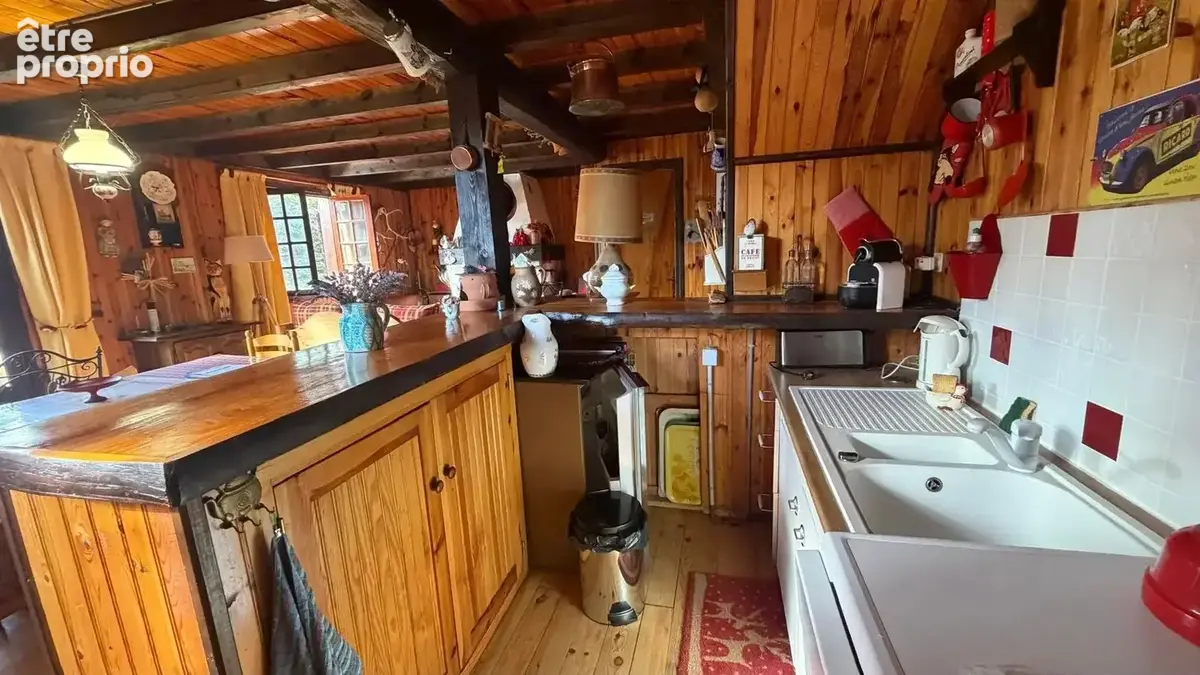 Chalet en bois avec terrasse plein sud et grand terrain arboré de 2 680 m² - photo 7