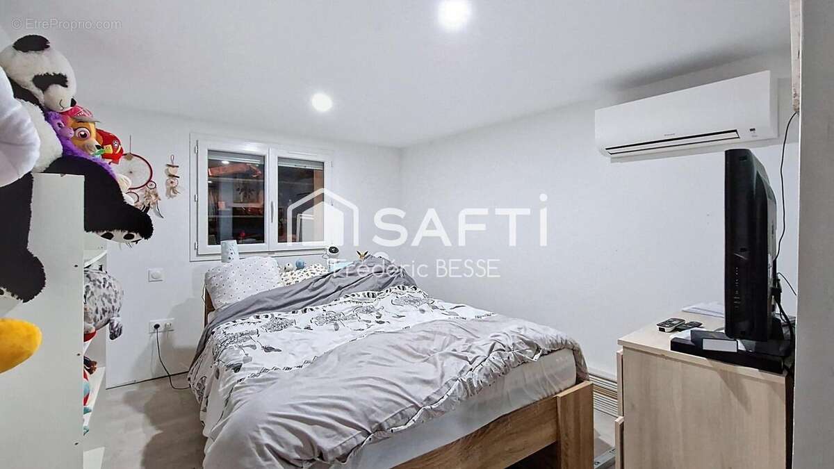 Photo 8 - Maison à LUSIGNAN-PETIT