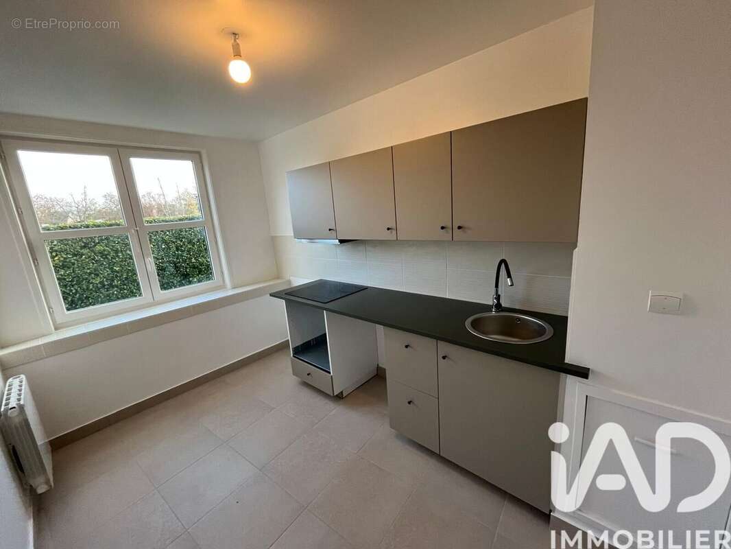 Photo 4 - Appartement à VOISINS-LE-BRETONNEUX