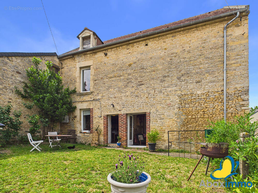 Maison à OLENDON