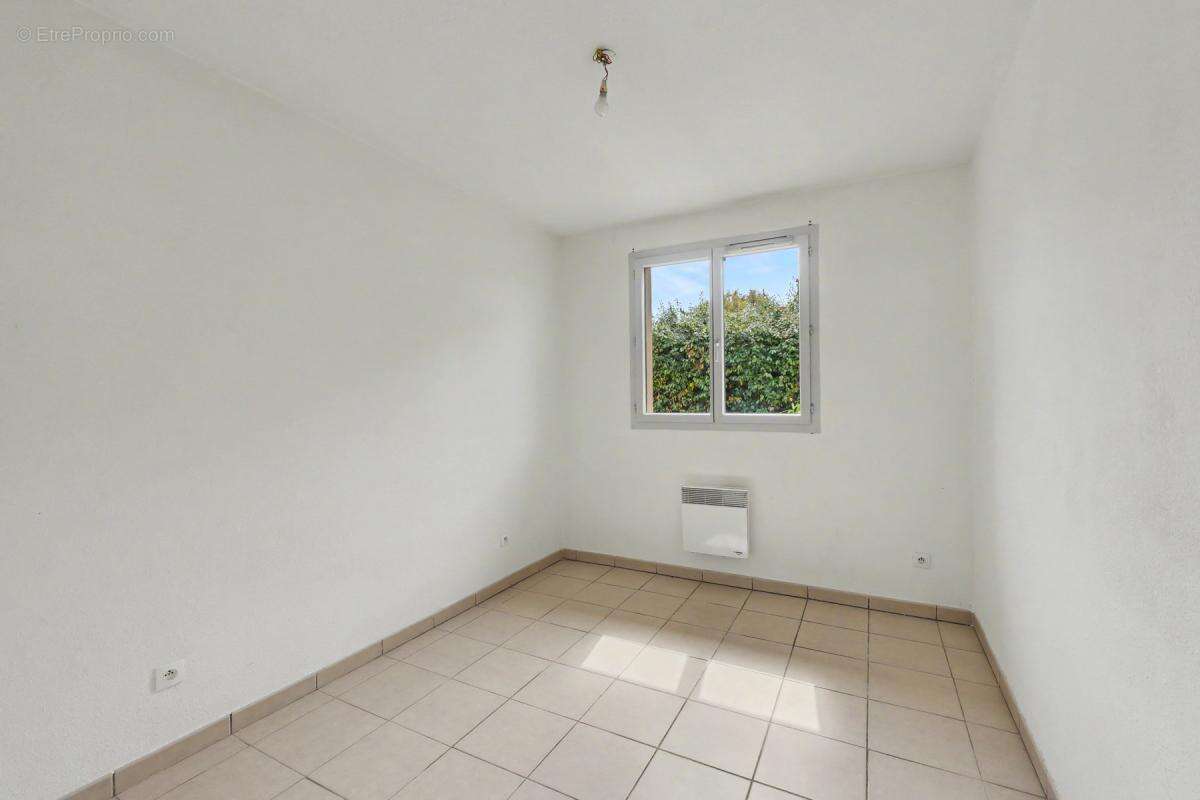 Maison 4 pièces 90 m² - Saint-Jory - Plain-pied avec jardin, garage et terrasse - photo 7