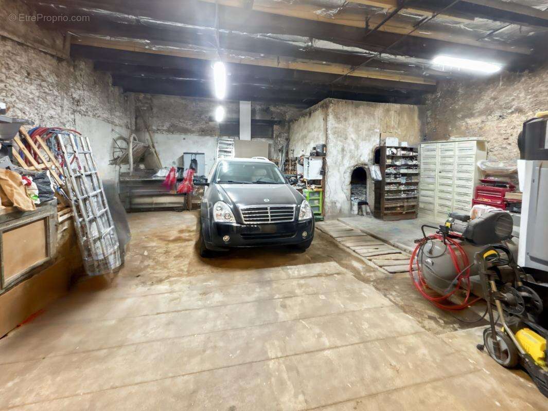 Maison de village rénovée avec grand garage de 100 m² - photo 11