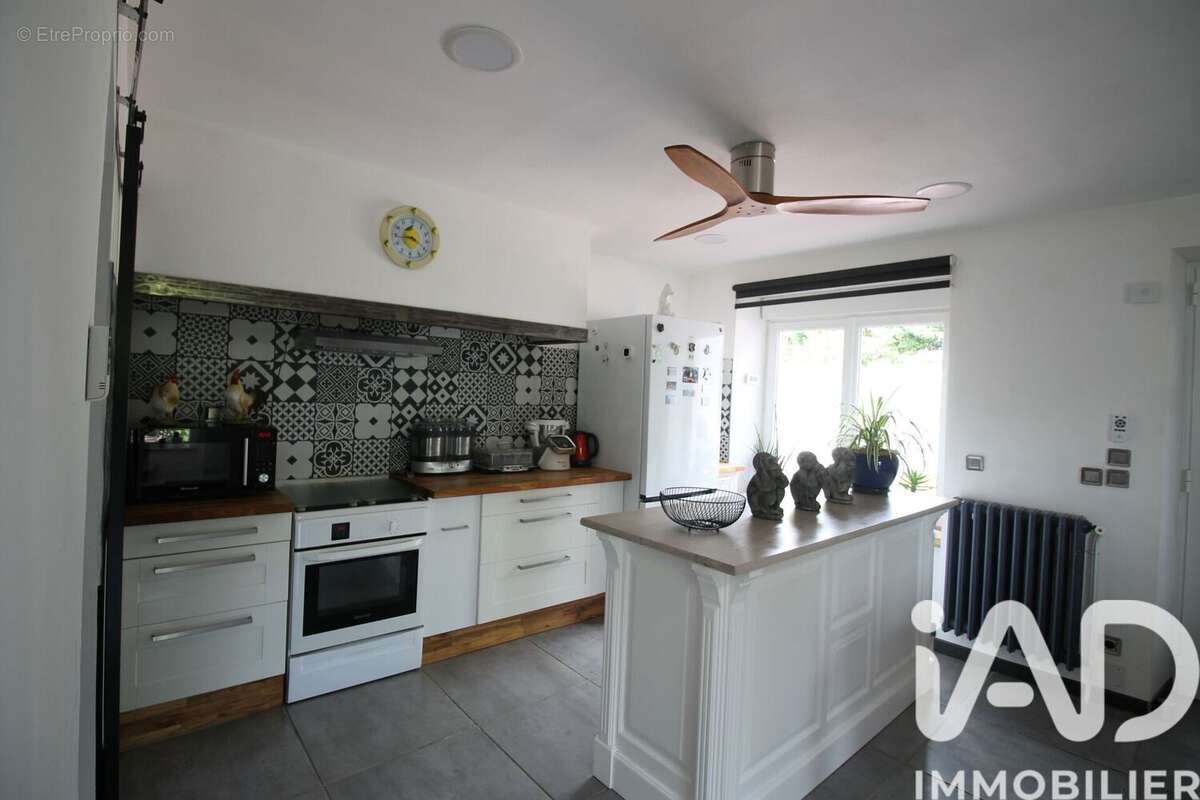 Maison 100 m² à Villefranche-De-Panat  - photo 6