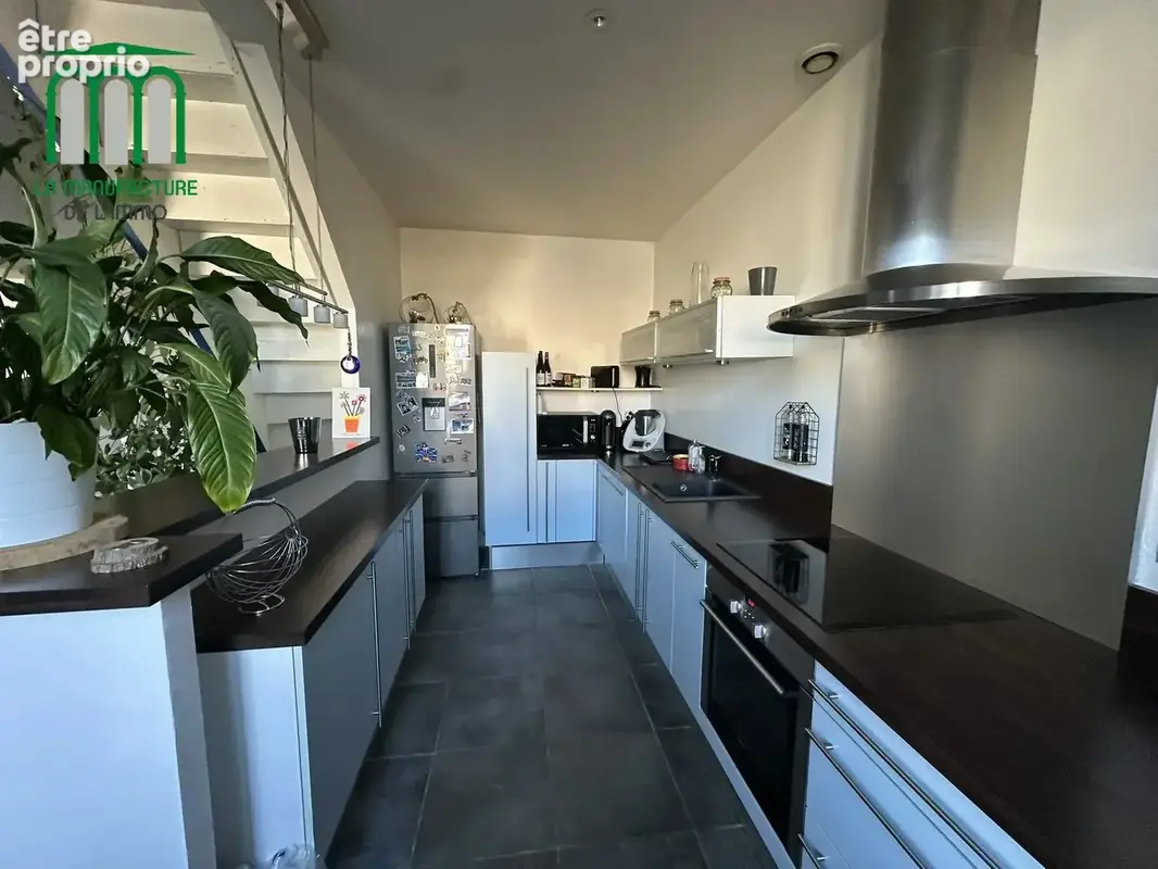 Appartement F4 avec terrasse, cave et garage Le Chambon-Feugerolles - photo 9