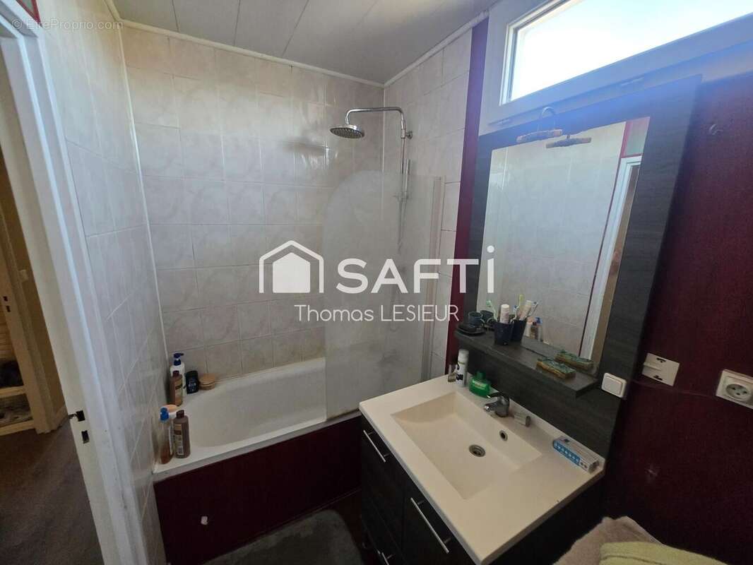 Photo 5 - Appartement à HEROUVILLE-SAINT-CLAIR