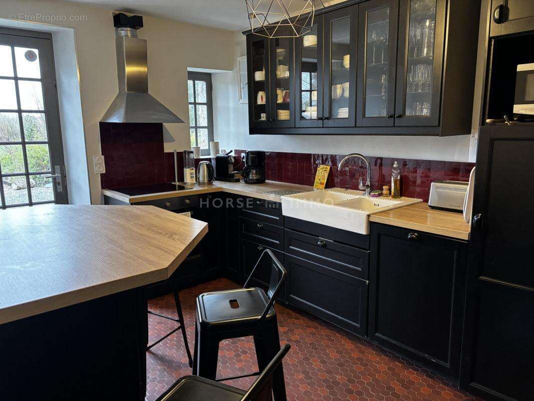 Maison à AGON-COUTAINVILLE