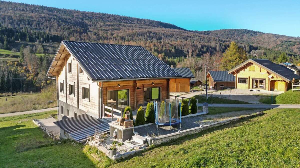 Spacieux chalet moderne T9 à Mijoux - photo 4
