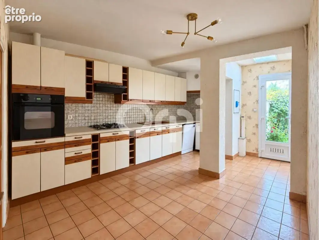  CALAIS – Maison de 107 m² avec 3 chambres, jardin et garage - photo 2