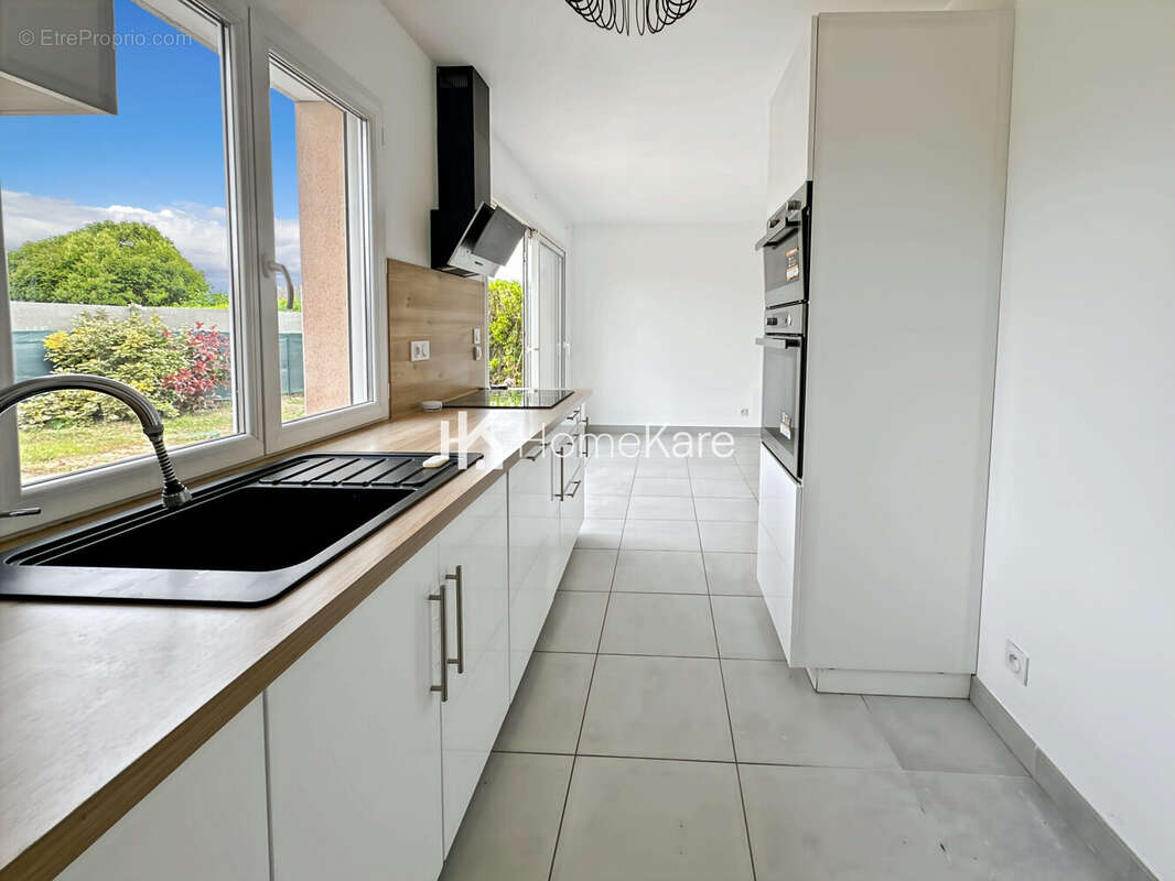 Maison 100 m² à Carbonne  - photo 2