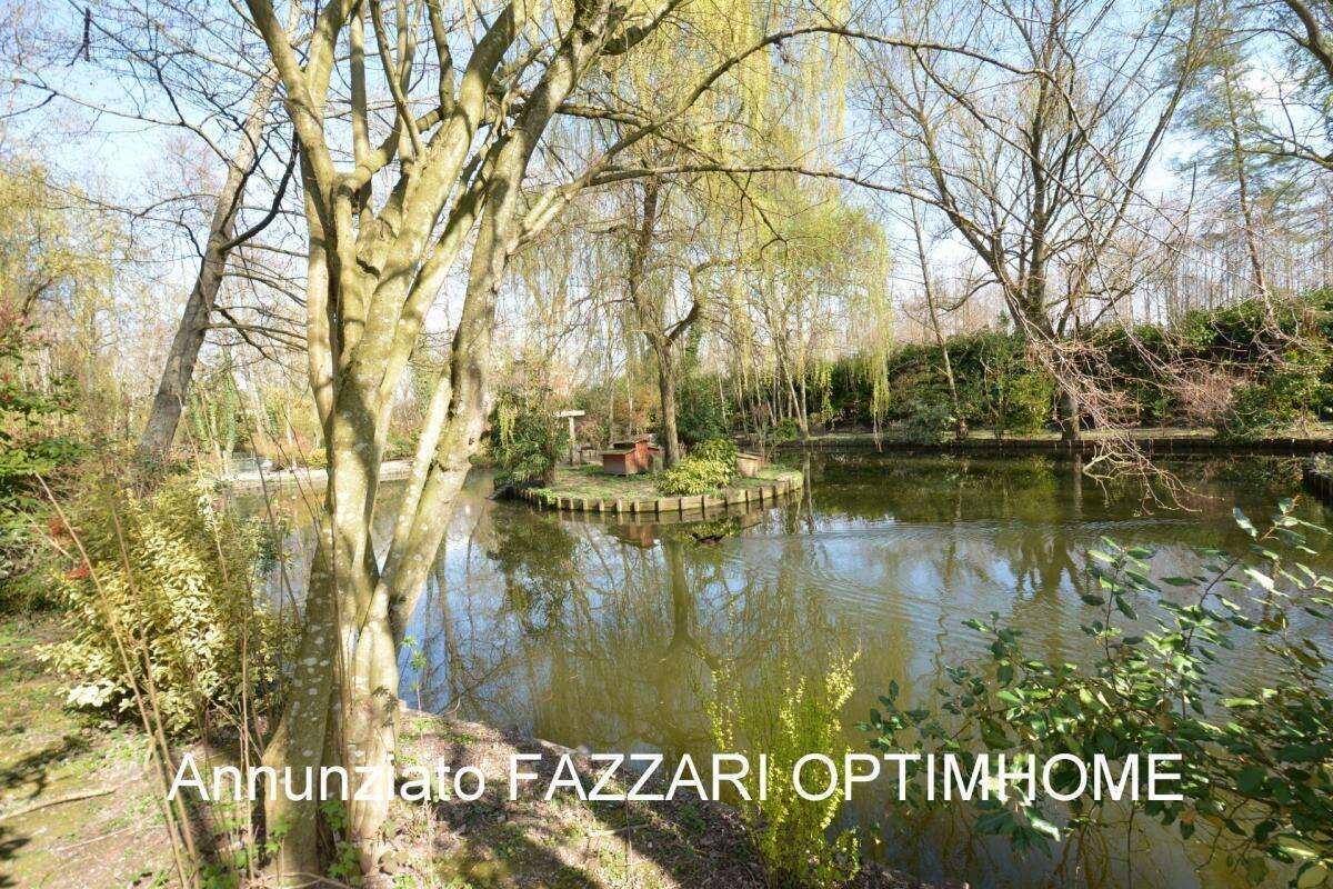 Au cœur d’un domaine clos de 1,5 hectare, ce moulin rénové offre un cadre unique entre étang, rivière et nature préservée - photo 22