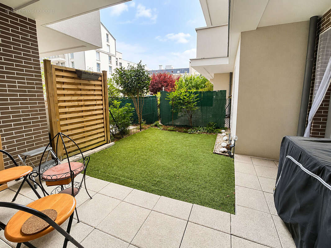 Appartement 2 pièces avec jardin et parking dans une résidence récente - photo 2