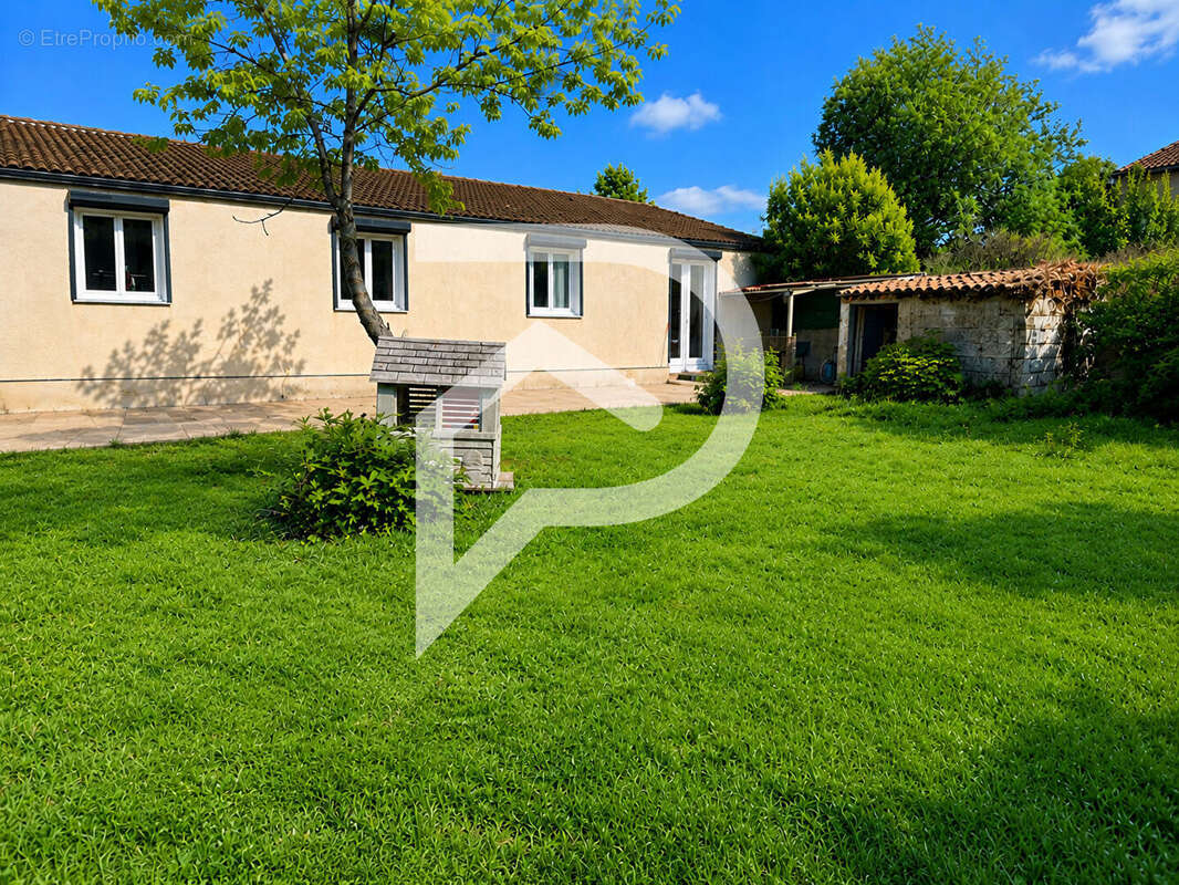 Maison familiale de plain-pied 4 chambres - DPE A - photo 4