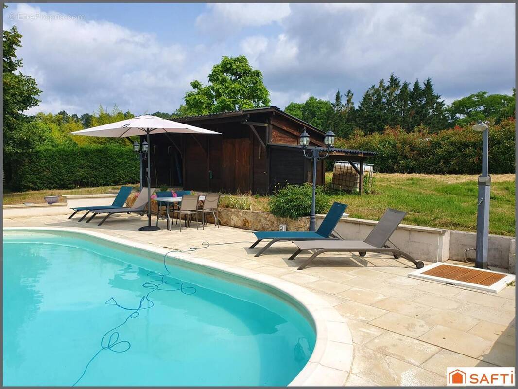 Photo 1 - Maison à BOURGNAC