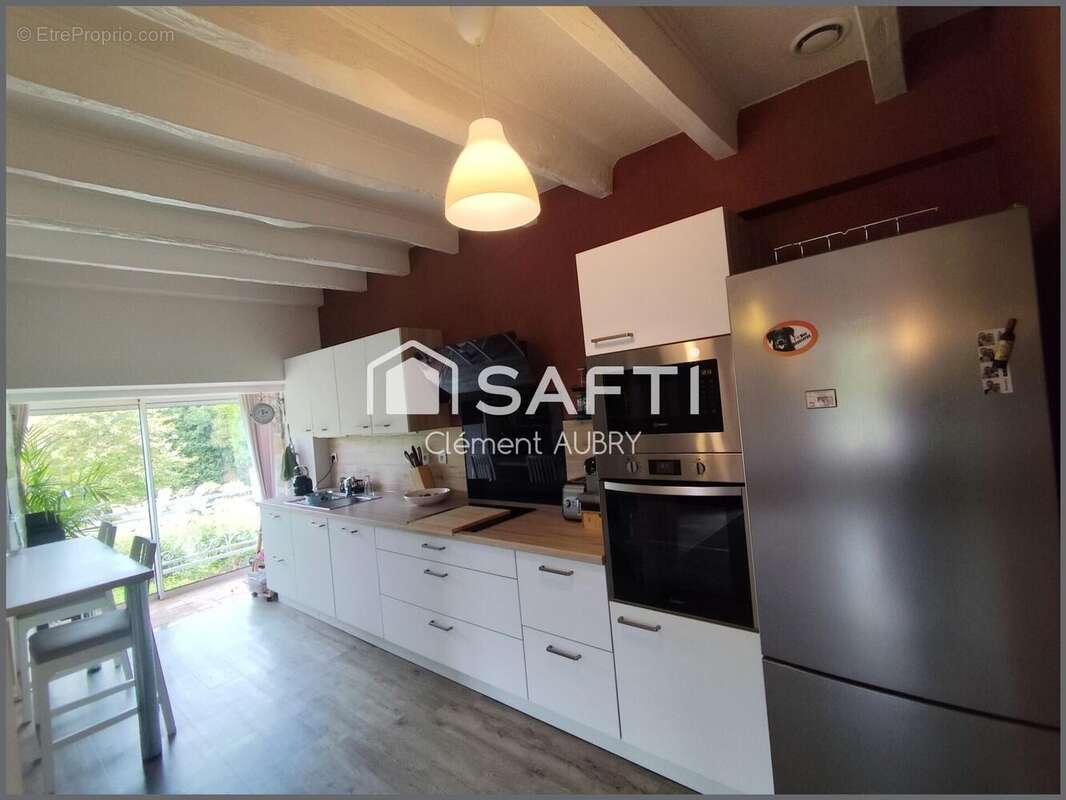 Maison 124 m² à Saint-Ouen-Des-Toits  - photo 5