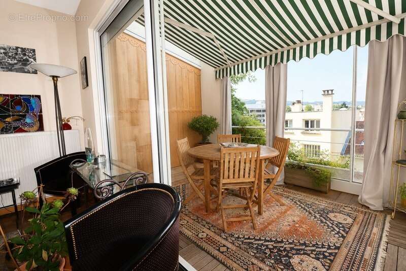 Élégante maison de ville avec toit-terrasse, véranda et jardin – Secteur privilégié de Villeboeuf - photo 4