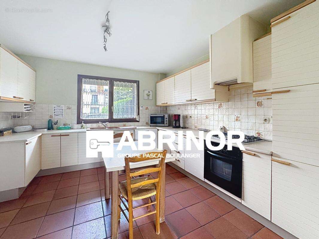 Maison individuelle - 3 chambres + bureau-mezzanine-cave-jardin-garage - photo 10