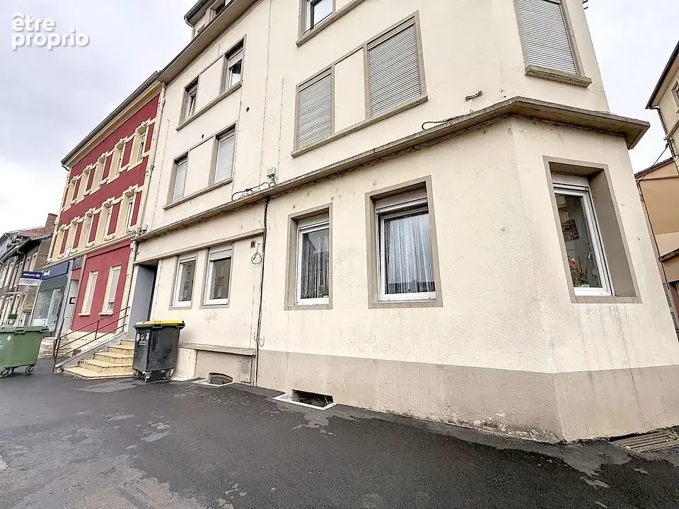 KNUTANGE - Appartement F3 de 67,20 m2 au RDC surélevé d'une petite copropriété bénévole -- 73 000,- € - photo 1