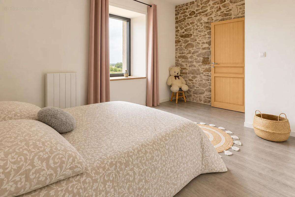Maison de 6 pièces de 157 m² à Aigrefeuille-sur-Maine - photo 10