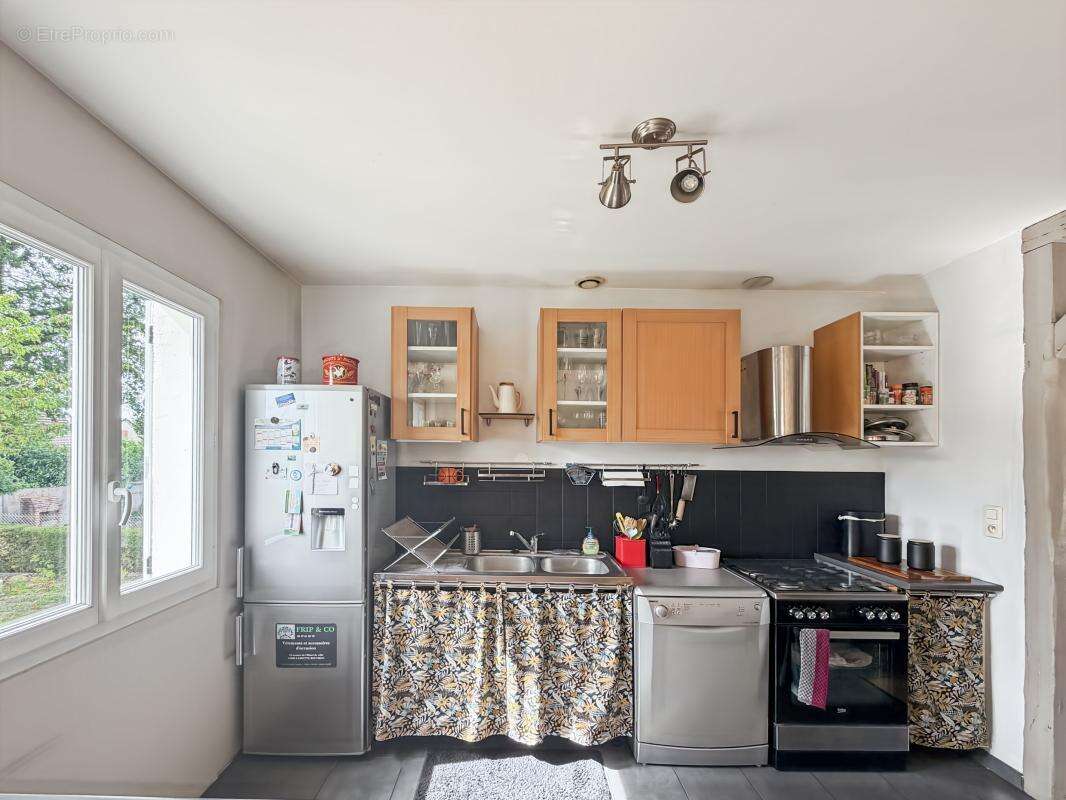 Maison 5 pièces familiale en centre-ville avec sous-sol total et beau jard - photo 5