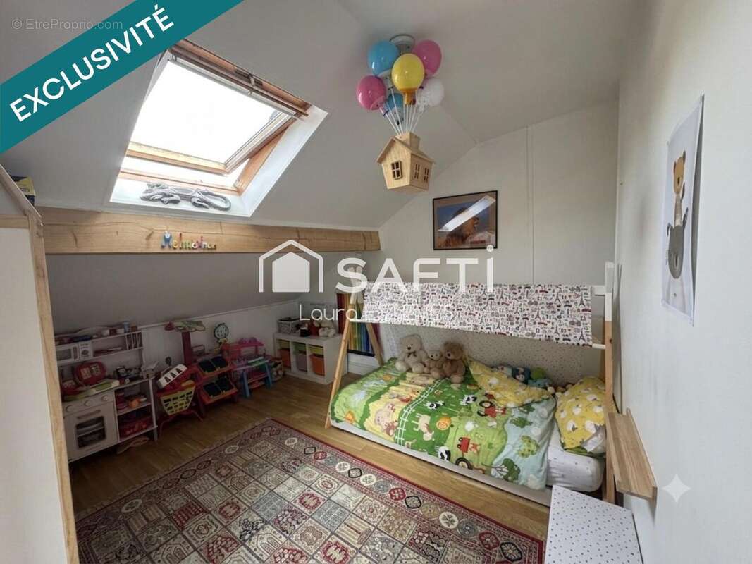 Maison 90 m² à Saint-Denis  - photo 7