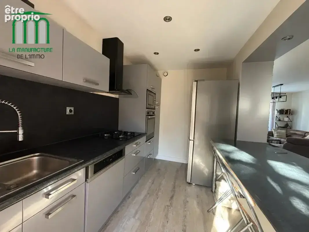 SAINT ETIENNE HAUTS DE JACQUARD - Maison T4 mitoyenne d'un côté de 81,28m² avec jardin + garage - photo 4
