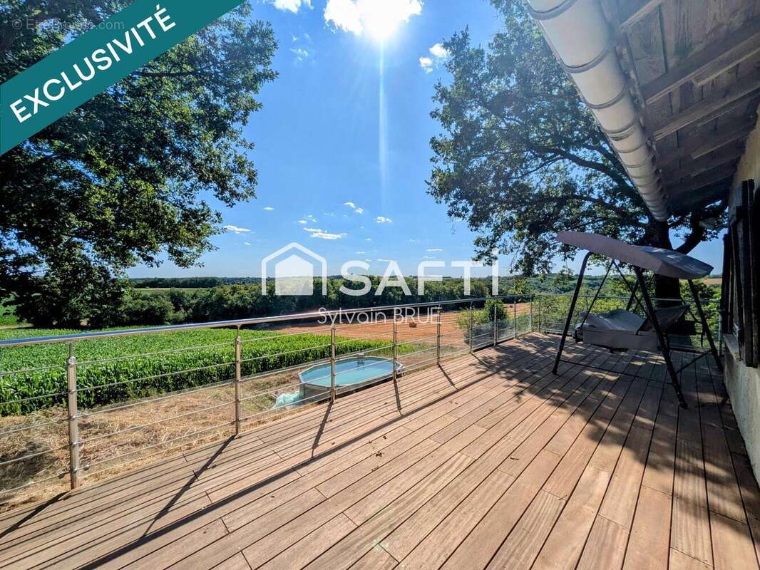 Photo 2 - Maison à CASTELNAU-MONTRATIER