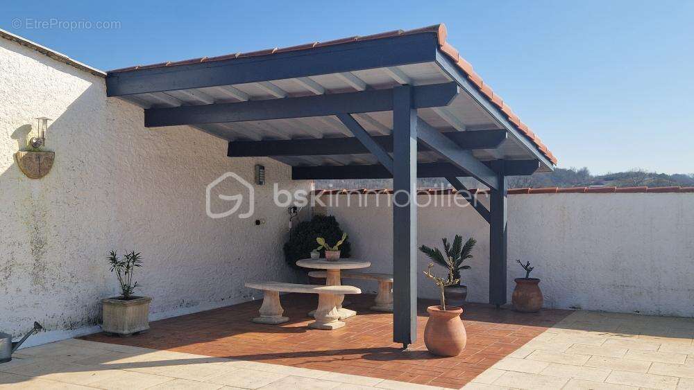 Maison plain pied - 4 chambres - veranda - grand garage - parc arbore - photo 5
