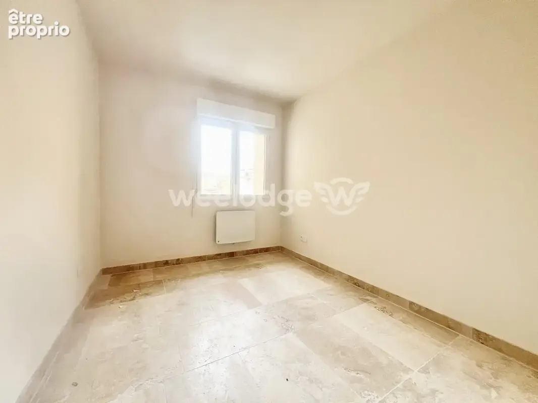 Appartement 3 pièces 70 m² à vendre à Remoulins (30210) - photo 3