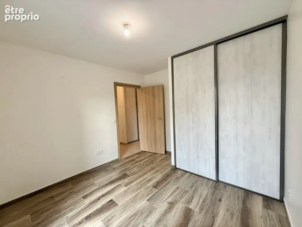 Appartement T3 récent avec deux balcons, garage et ascenseur - photo 16