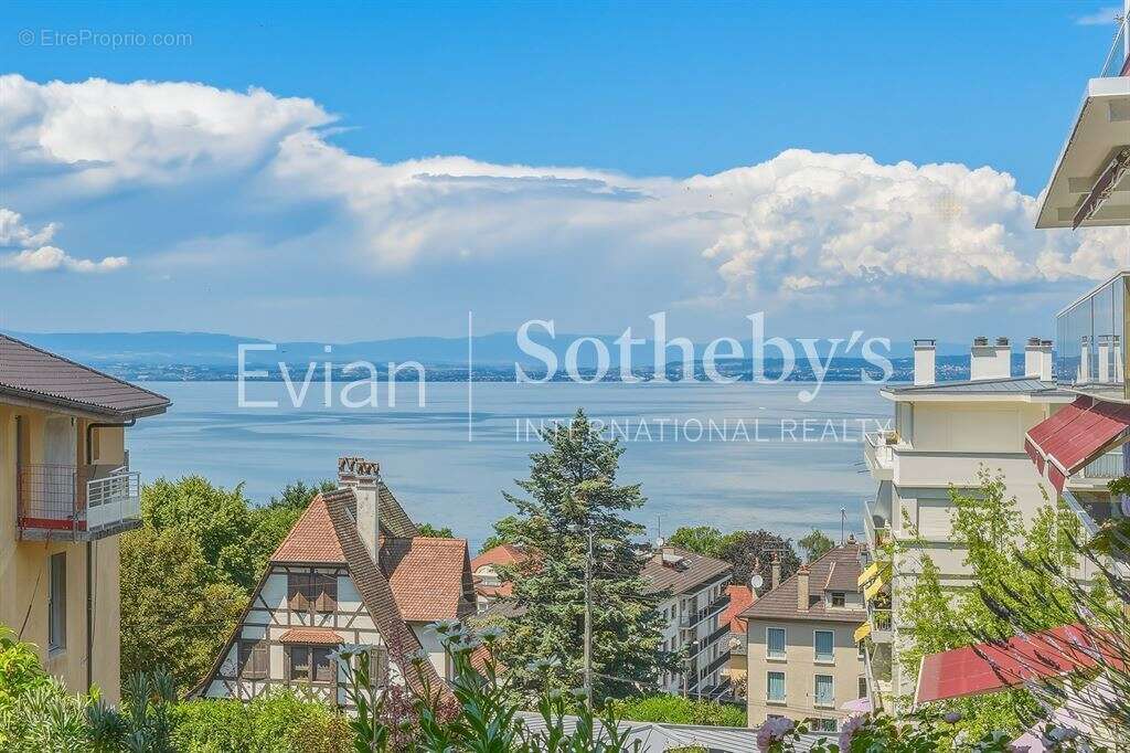 Rare, Evian, T4 en rez de jardin surélevé de 113 m2 avec vue lac et terrasse de 82 m2. - photo 18