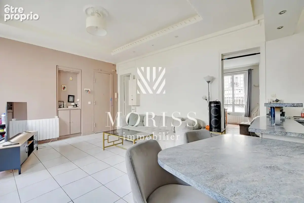 Appartement trois pièces - rue simart - 75018 paris - photo 5