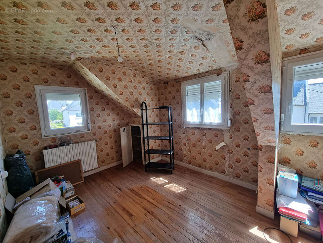 Centre ville de BEGARD, quartier calme, proximité de toutes les commodités - photo 7