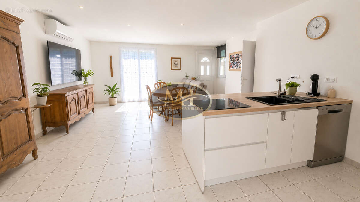 Maison T4 de plain-pied avec garage sur terrain arboré de 586 m2 - photo 7