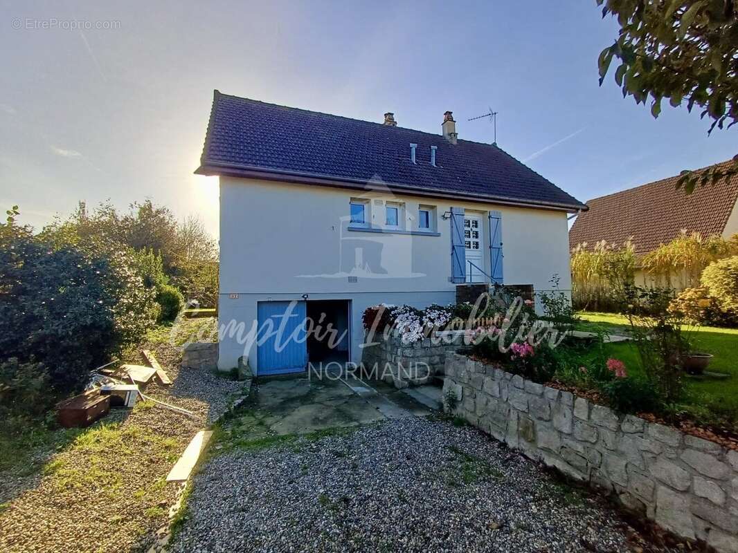 Maison à THIL-MANNEVILLE