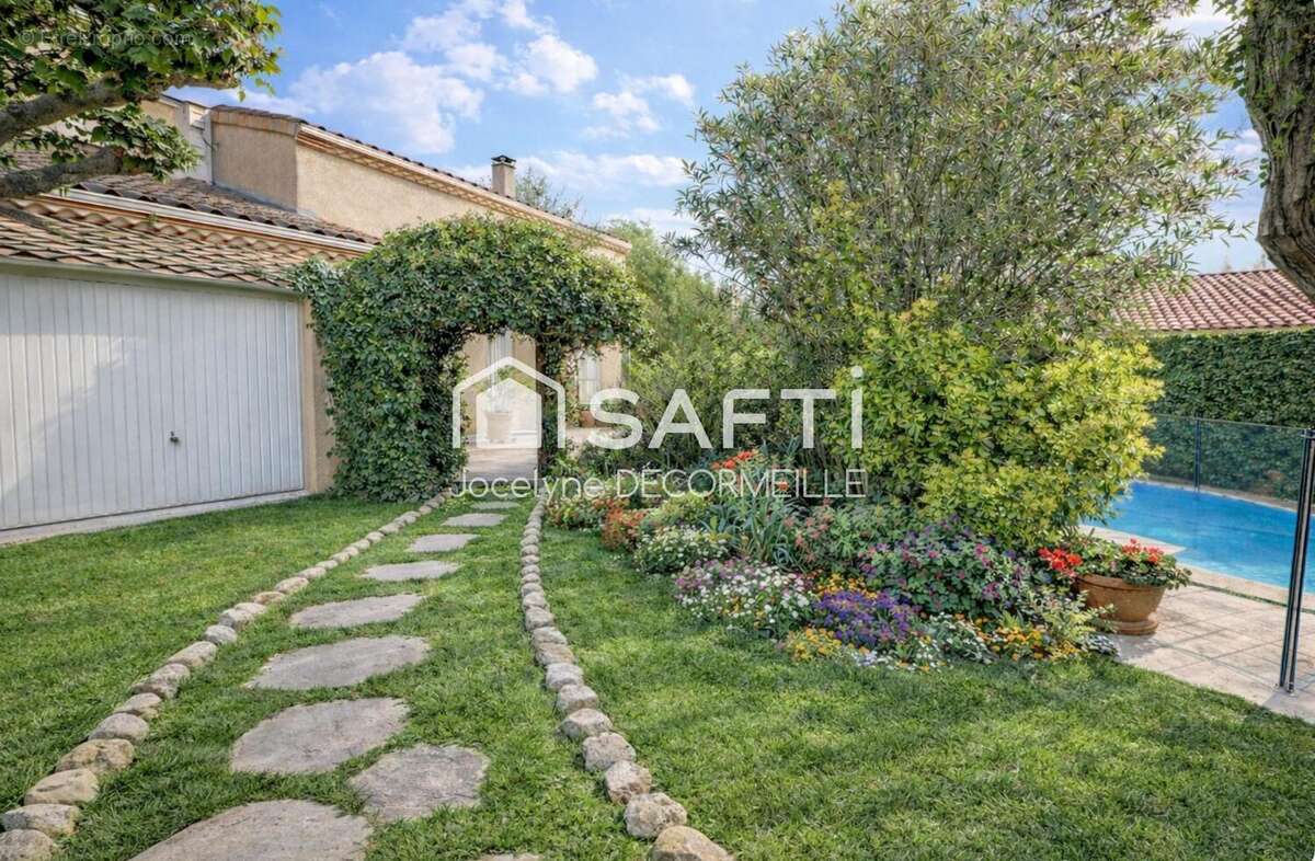 Photo 2 - Maison à LAUNAGUET