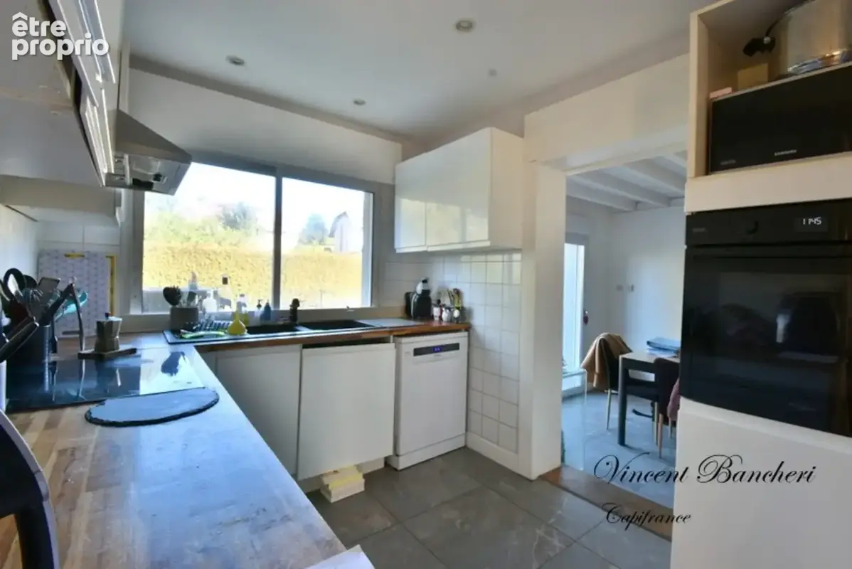 Maison familiale d'environ 160 m² avec piscine, 5 chambres et terrain de plus de 1160 m² au cœur d'un secteur prisé de Reignier - photo 5