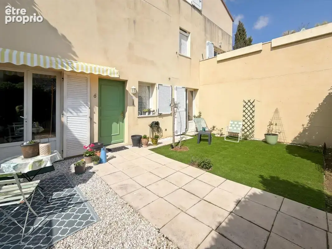 Appartement à vendre T2 situé en rez-de-jardin de 50 m² avec Jardin Privatif & Garage + climatisation - photo 4