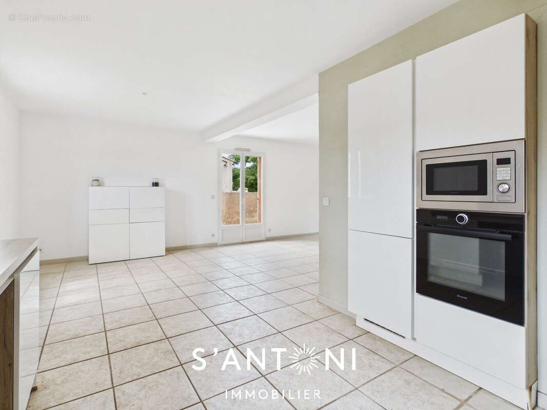 Maison meze t4 sur parcelle de 300 m² - photo 3