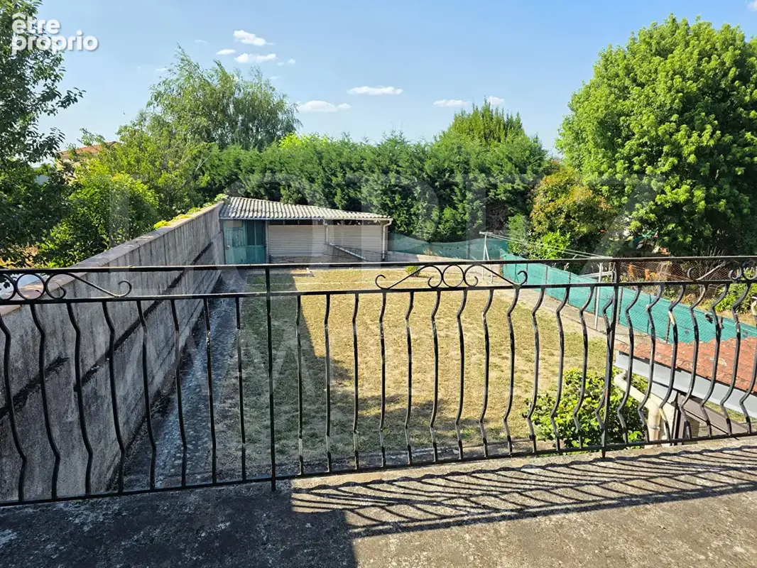 Maison avec garage et jardin - photo 2
