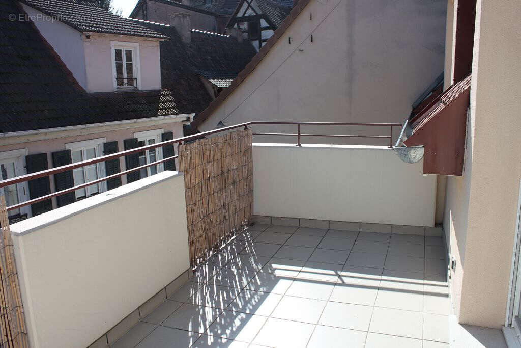 Appartement 3/4 pieces avec balcon et garage - centre ville - photo 2