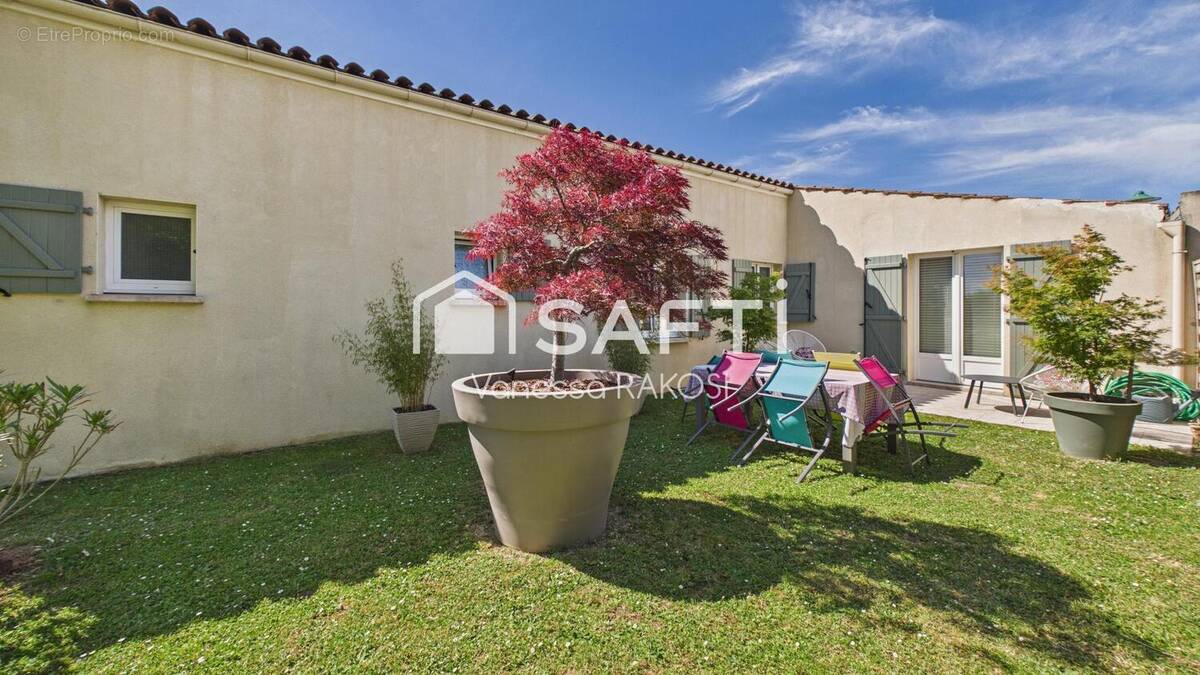 Photo 1 - Maison à LES EGLISES-D'ARGENTEUIL