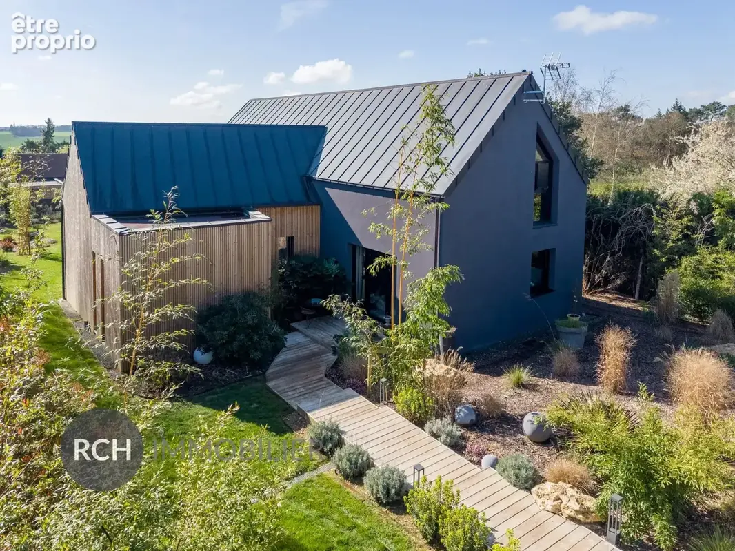 Belle maison d'architecte nichée dans un environnement privilégié - photo 3